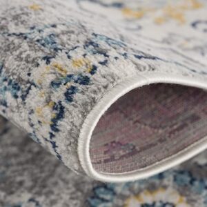 Close-up of rolled patterned carpet corner.