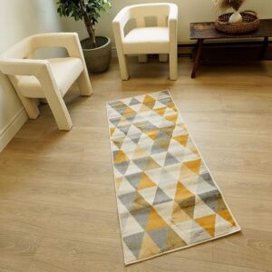 Geometric rug in modern living room with chairs.