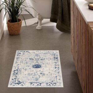 Elegant bathroom with floral-patterned rug and bathtub.