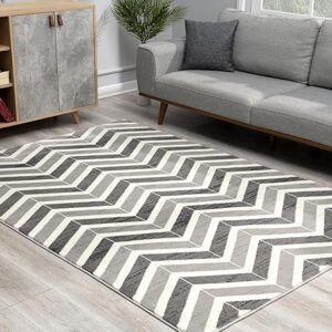 Modern living room with chevron patterned rug.