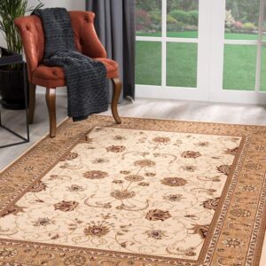 Elegant floral-patterned rug and orange chair by window.