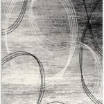 Abstract gray rug with wavy line patterns.