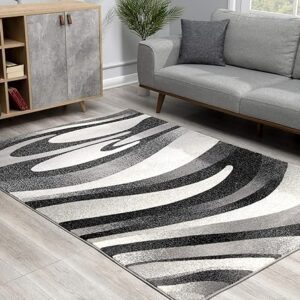 Modern living room with abstract patterned rug.