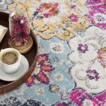Colorful rug with coffee and open book