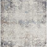 Abstract floral pattern area rug in neutral colors.