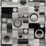 Geometric black and gray pattern rug with circles.