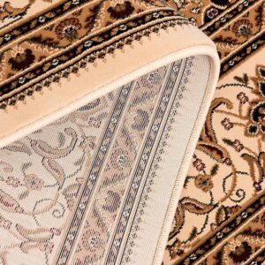 Detailed close-up of ornate beige carpet pattern.