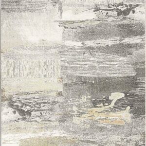 Abstract textured gray and beige area rug.