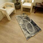 Modern rug with abstract design in cozy room.