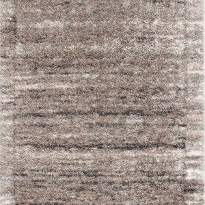 Textured beige shaggy area rug