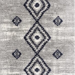 Gray geometric pattern rug with diamond shapes.