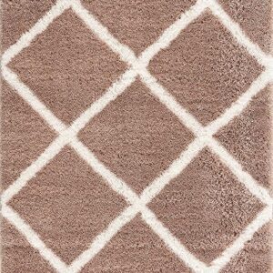 Beige rug with white geometric diamond pattern