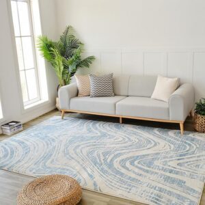 Modern living room with blue patterned rug.