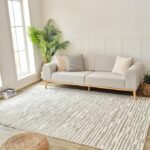 Modern sofa with cushions in elegant living room