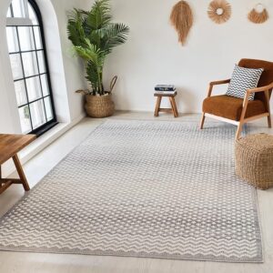 Modern living room with patterned rug and decor.