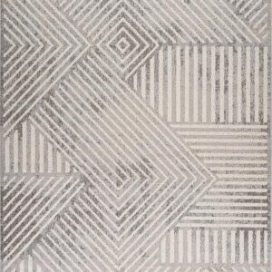 Geometric pattern rug with gray and white stripes.