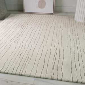 Beige rug with vertical lines on floor
