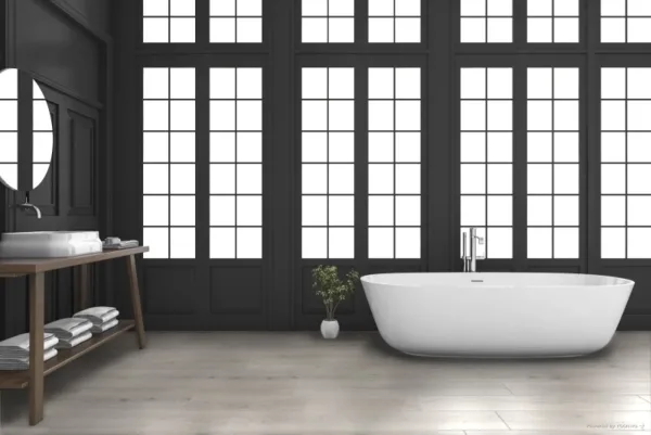 Modern bathroom with freestanding tub and large windows