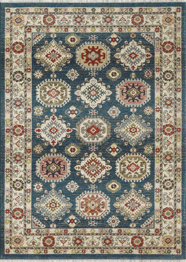 Intricate blue oriental rug with floral designs.