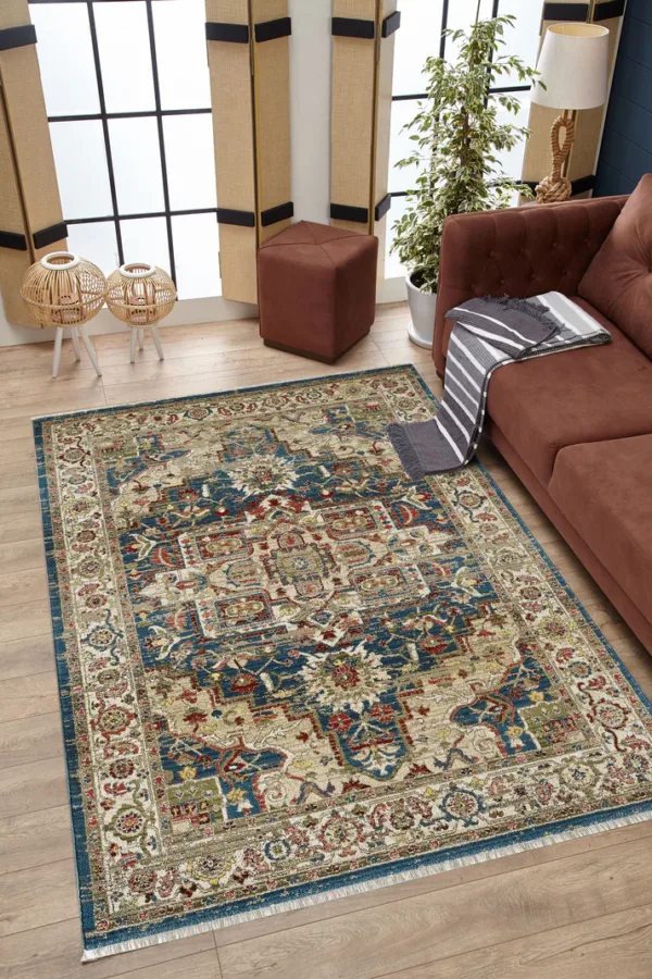 Living room with persian rug and brown sofa.