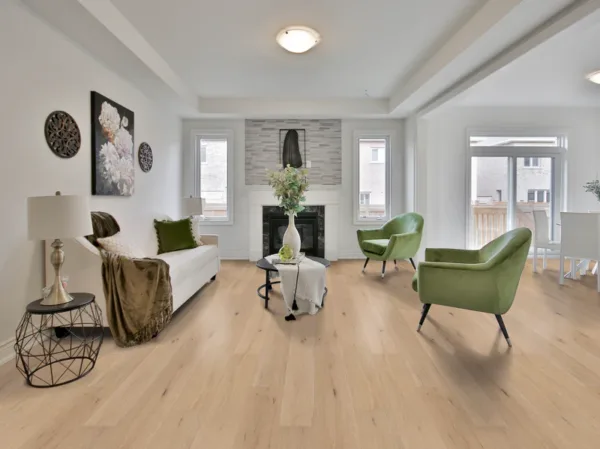 Modern living room with green chairs and fireplace.