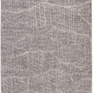 Gray textured patterned rug with abstract design.