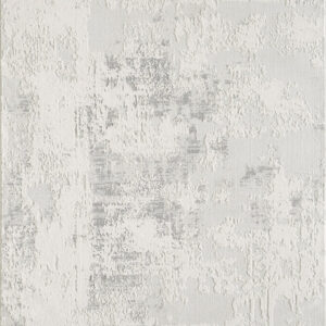 Textured abstract white and gray wall pattern.