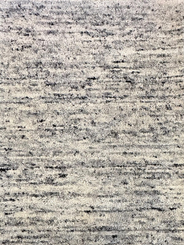 Close-up of textured gray carpet fabric