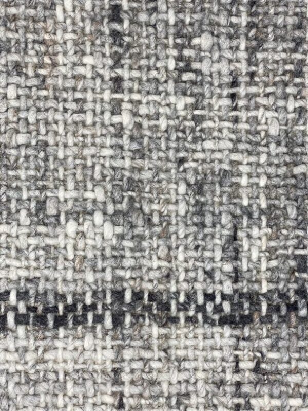 Close-up of gray woven fabric texture.