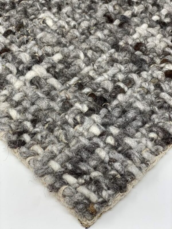 Gray and white woven wool rug texture