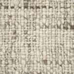 Beige textured woven fabric close-up