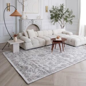 Elegant living room with white sectional sofa.