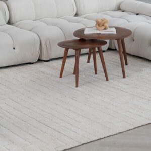 Wooden tables with book on beige carpet