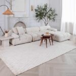 Modern living room with white sectional sofa