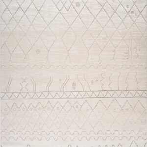 Textured beige rug with geometric patterns.