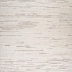 Cream-colored rug with subtle textured pattern.