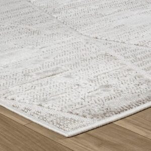 Textured white rug on wooden floor