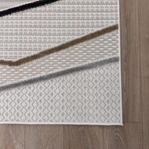 Geometric pattern rug on wooden floor