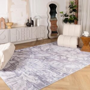 Modern living room with elegant floral-patterned rug.