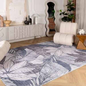 Stylish living room with floral rug and modern decor.