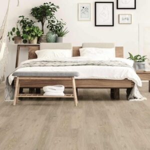 Minimalist bedroom with wooden floor and hammock.