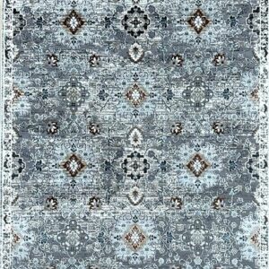 Intricate blue and beige oriental patterned rug.