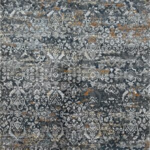 Ornate blue and orange floral patterned rug