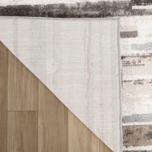 White area rug on wooden floor