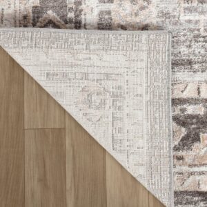 Corner of rug on wooden floor