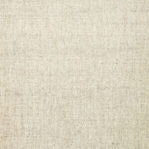 Close-up of natural beige woven linen fabric