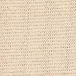 Close-up of cream-colored textured woven fabric