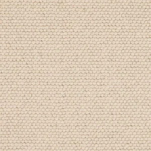 Close-up of beige loop-pile carpet texture