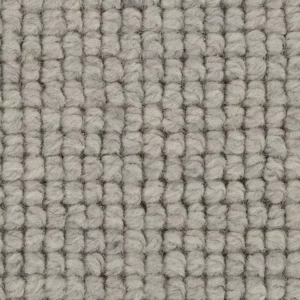 Close-up of textured light gray loop-pile carpet