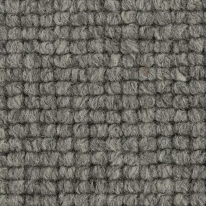 Close-up of gray looped wool carpet texture